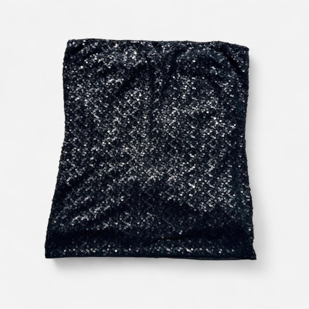Black sequin tube top with an allover shimmer finish